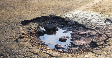 image showing pothole in road