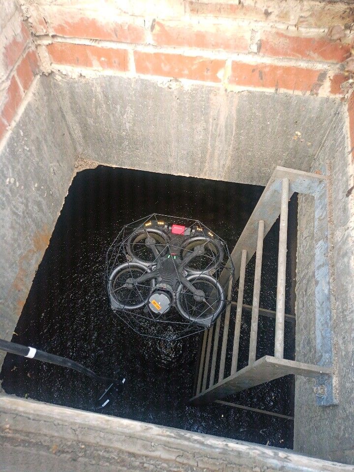 Elios camera drone flying in to underground manhole