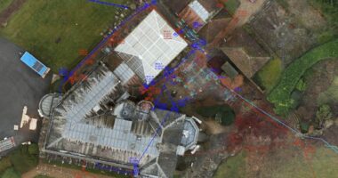 an orthomosiac image showing a drone photograph with the utilities and underground services positions overlaid to it